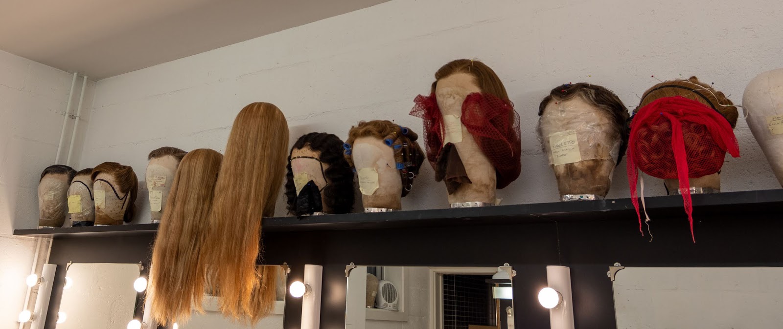 Glyndebourne production wigs in one of the Marlowe Theatre dressing rooms
