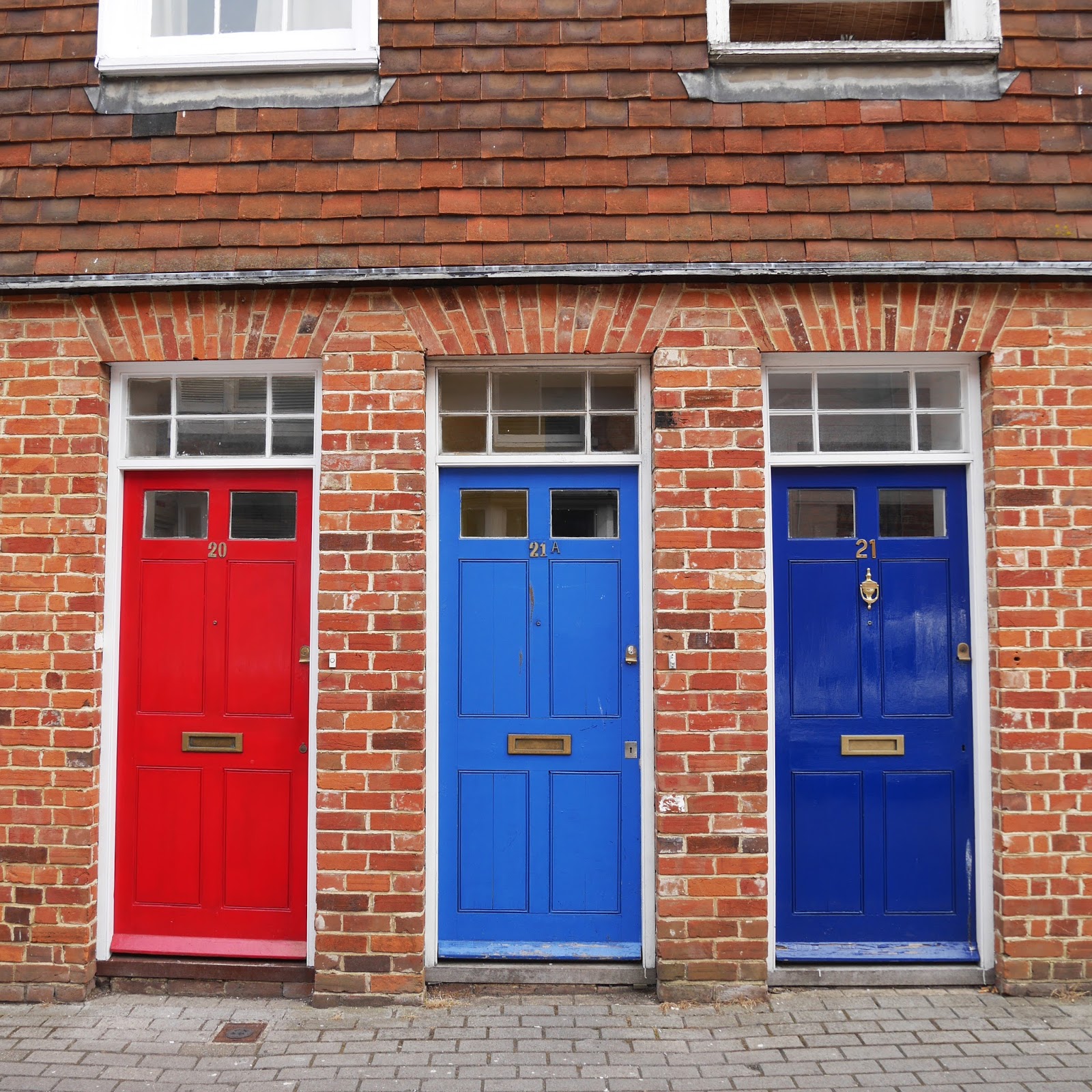 Painted doors on Love Lane in Canterbury, Kent