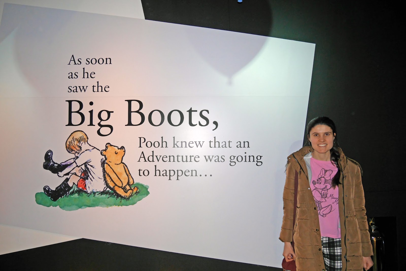 Me (Kat Last) at the entrance of the Winnie the Pooh: Exploring a Classic exhibition at the Victoria and Albert Museum, London