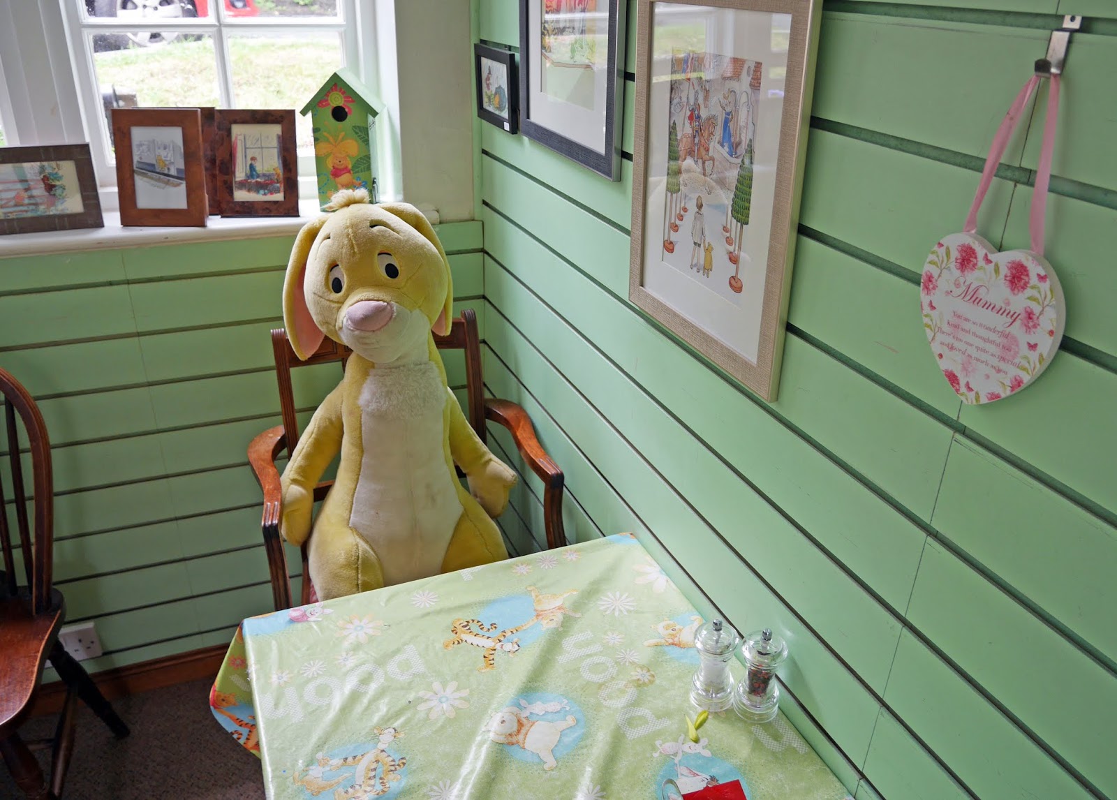 Rabbit sitting at a table at Pooh Corner, Ashdown Forest