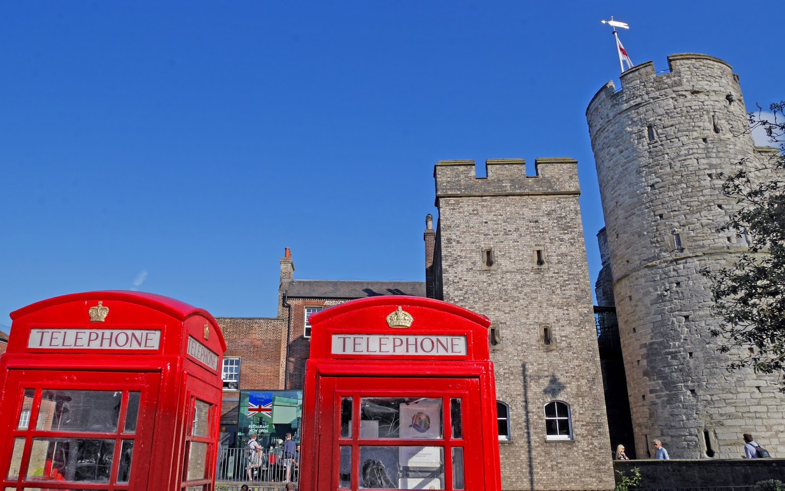 Telephone boxes in front of the Westgate, Canterbury