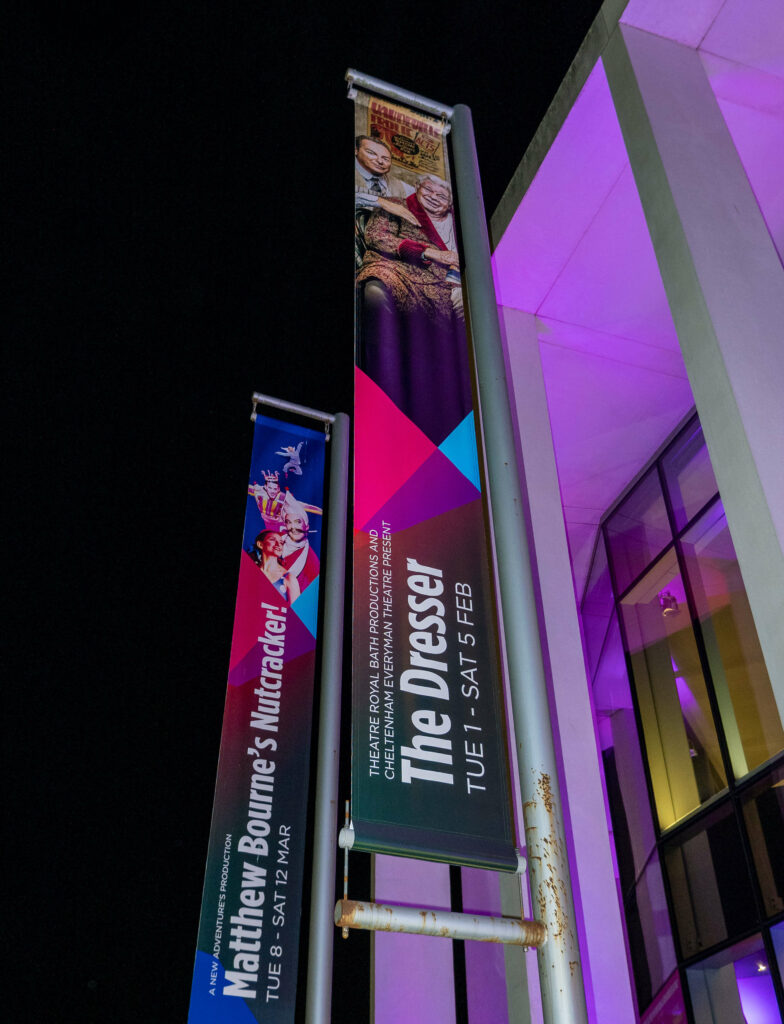 Promotional banner for The Dresser outside The Marlowe Theatre, Canterbury