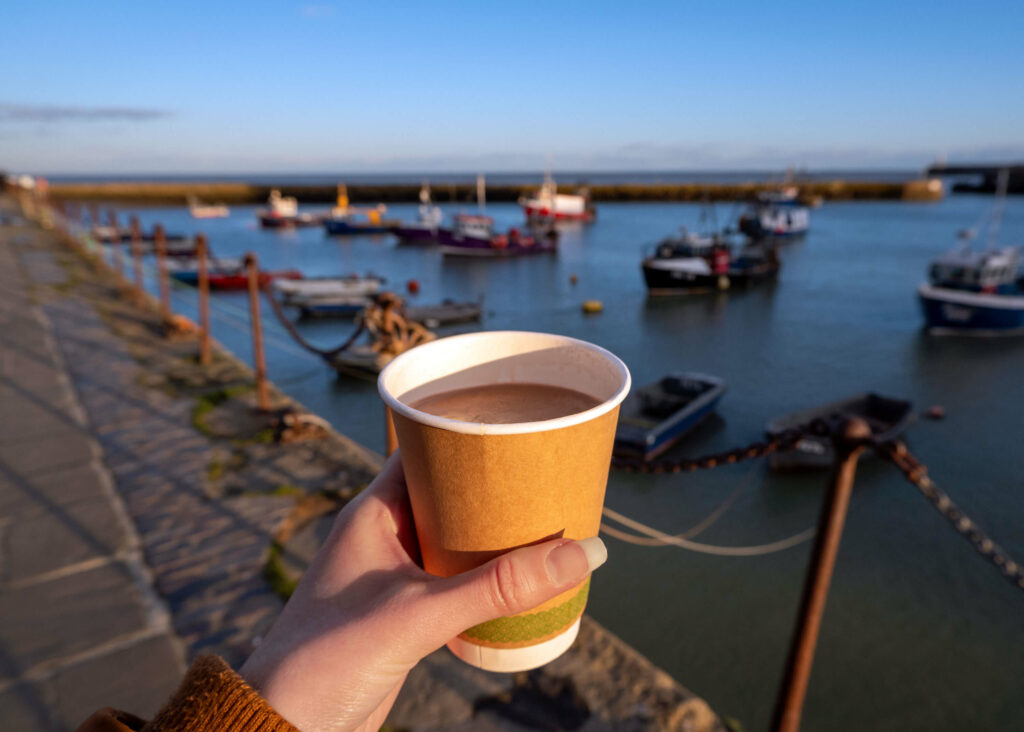 Enjoying a hot chocolate in Folkestone Harbour, Kent