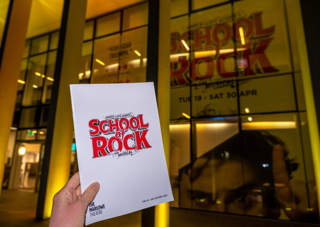 School of Rock the Musical programme outside The Marlowe Theatre, Canterbury