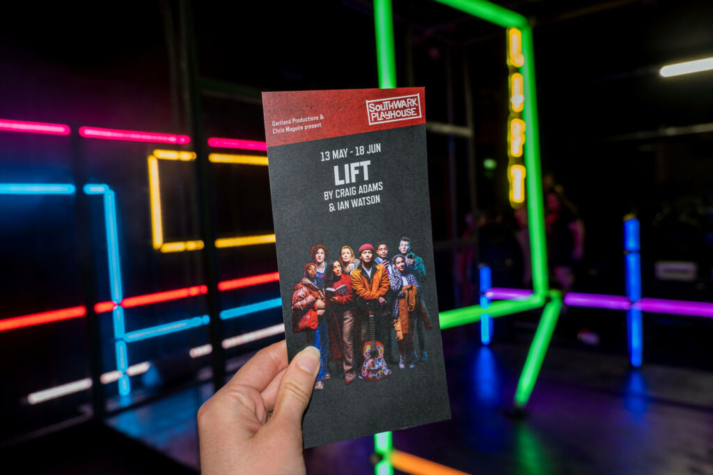 Lift the Musical leaflet in front of the set