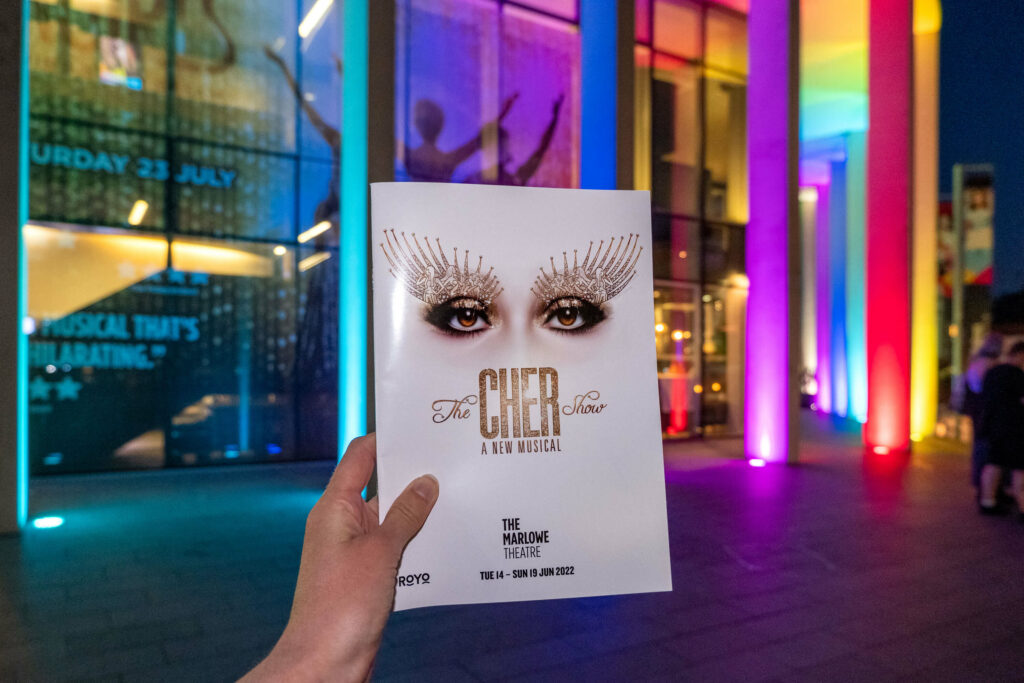 The Cher Show programme outside The Marlowe Theatre, Canterbury