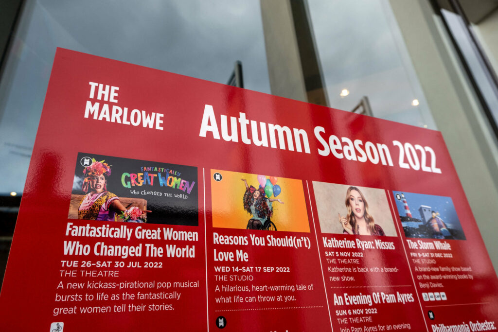 The 2022 Autumn season poster outside of The Marlowe Theatre, Canterbury