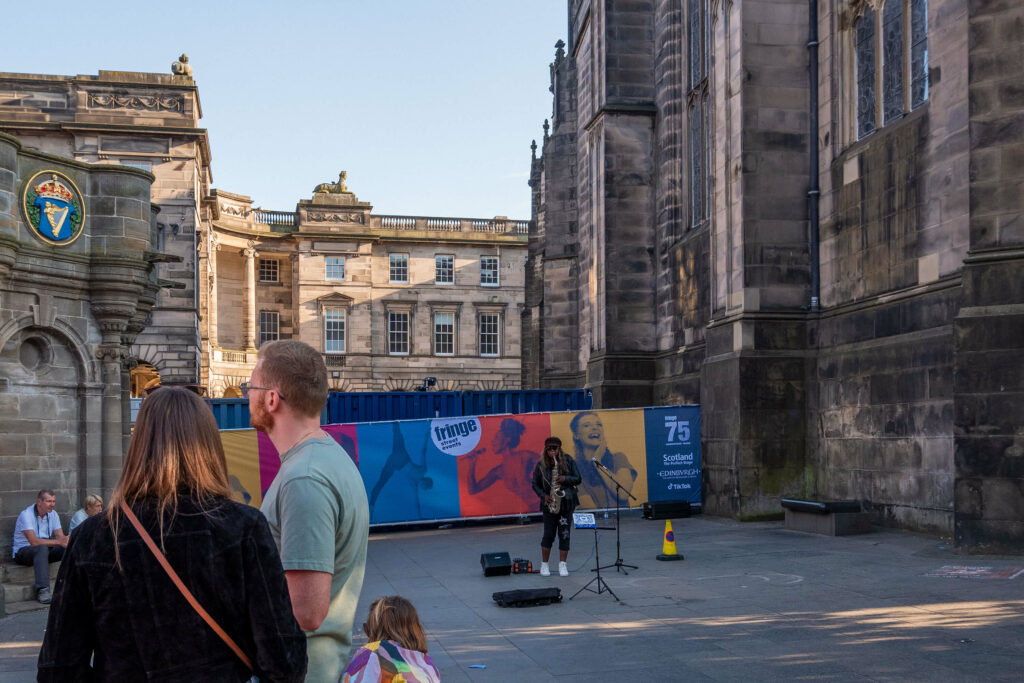 Edinburgh Fringe musical street performance on the Royal Mile