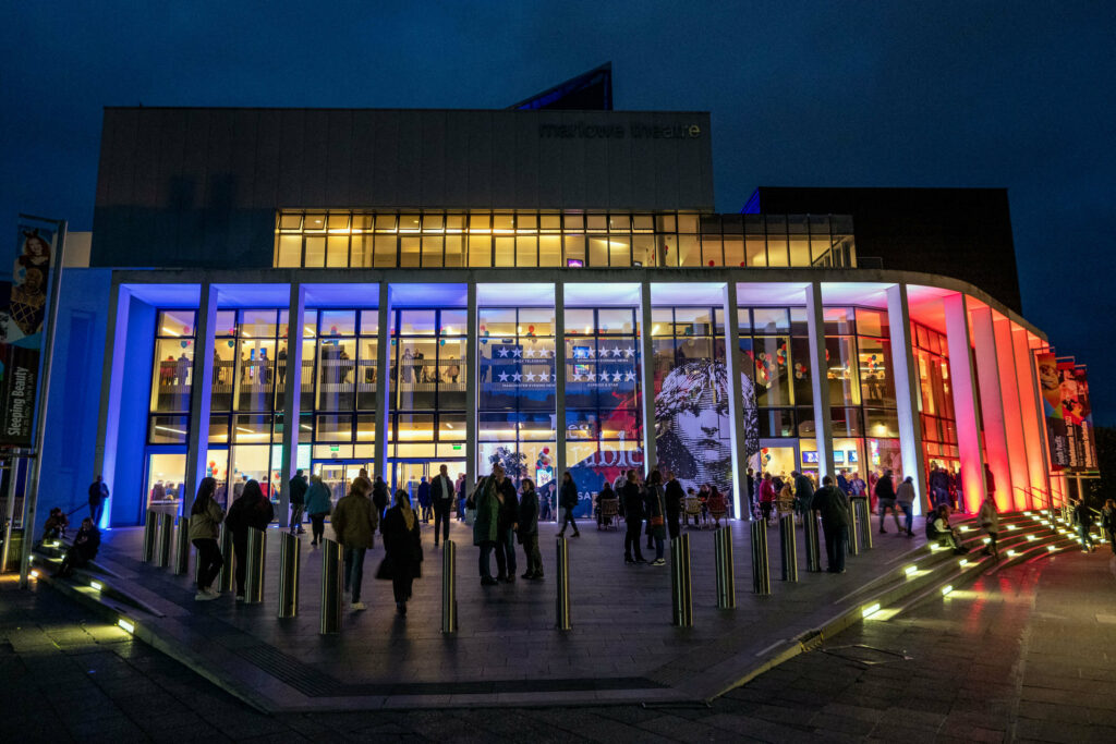 Les Miz blue, white and red lights outside of The Marlowe Theatre