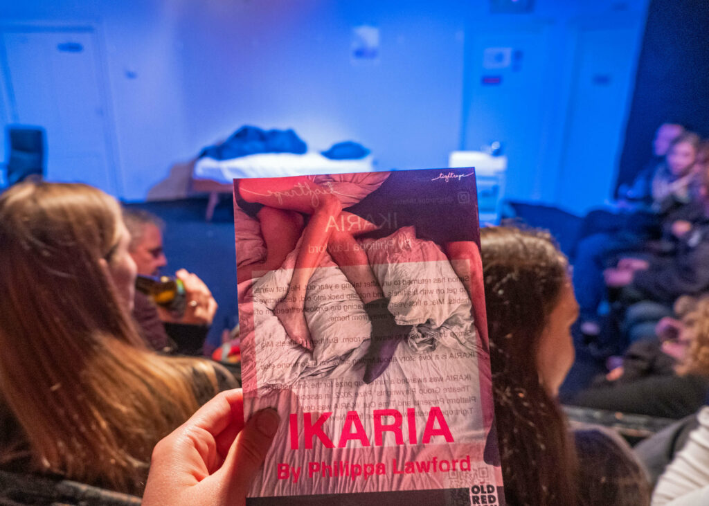 IKARIA flyer in front of the set at the Old Red Lion Theatre, London