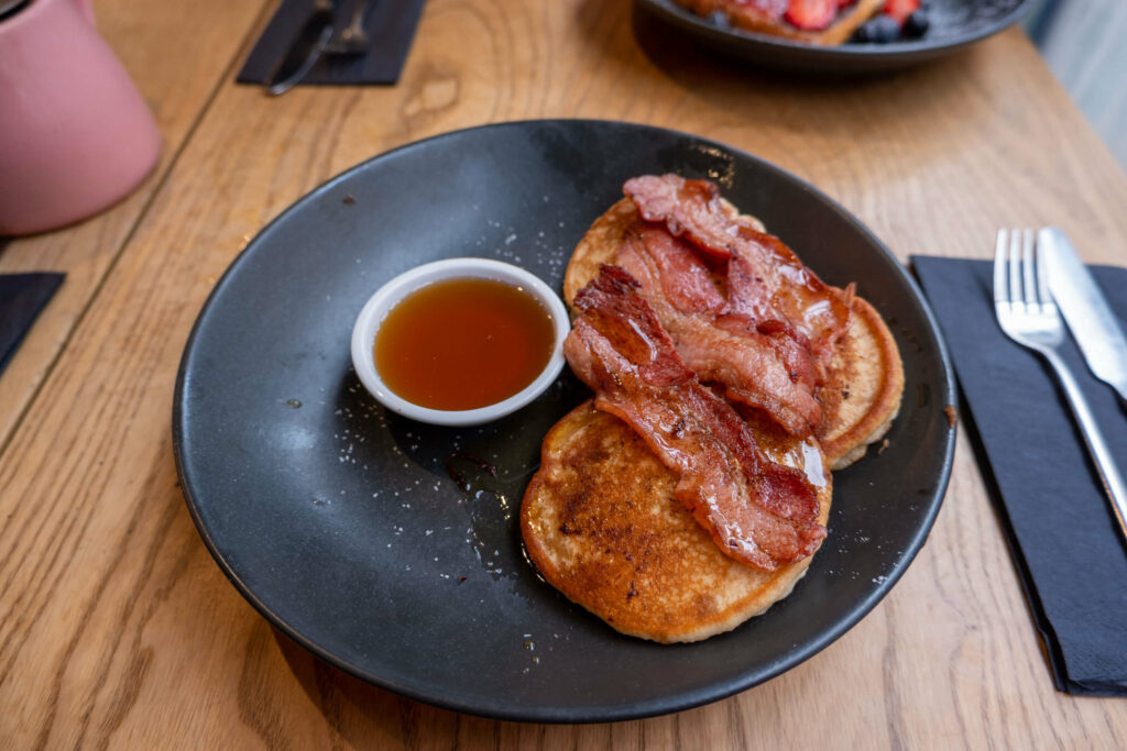 Pancakes with bacon and syrup at Lost Sheep Coffee & Kitchen, Canterbury