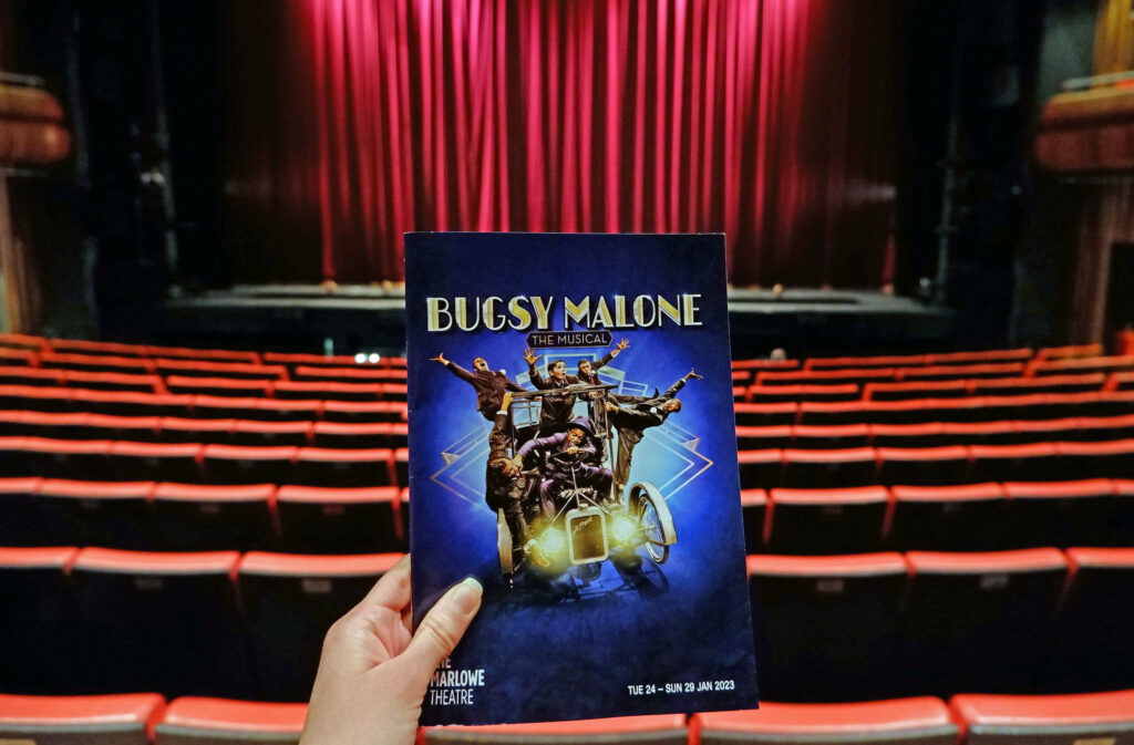 Bugsy Malone programme inside The Marlowe Theatre auditorium, Canterbury