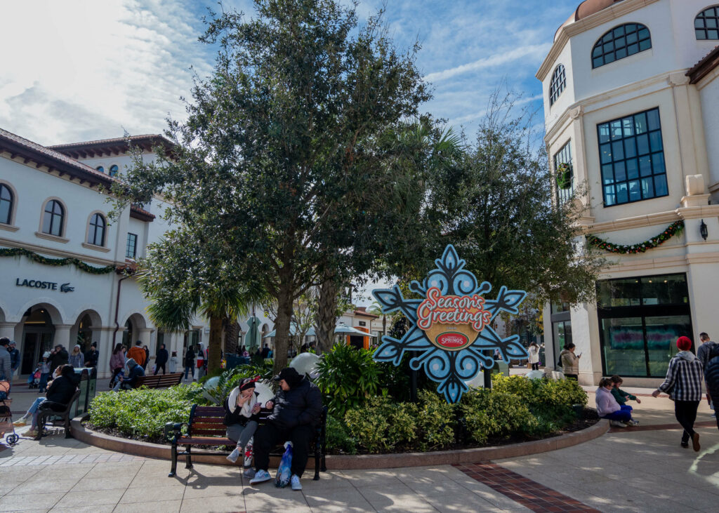 Season's Greetings sign at the Disney Springs shopping village in Walt Disney World