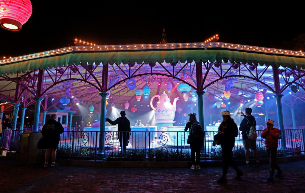 Festive theming on the Mad Tea Party attraction at Mickey's Very Merry Christmas Party