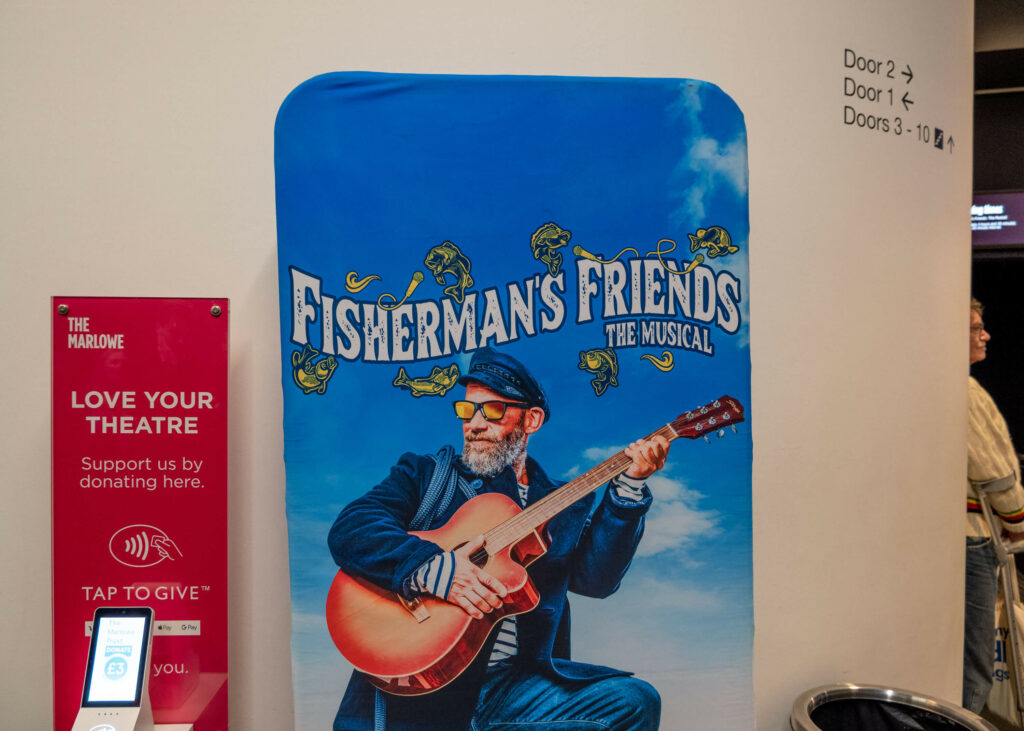 Fisherman's Friends the Musical poster in the lobby of The Marlowe Theatre