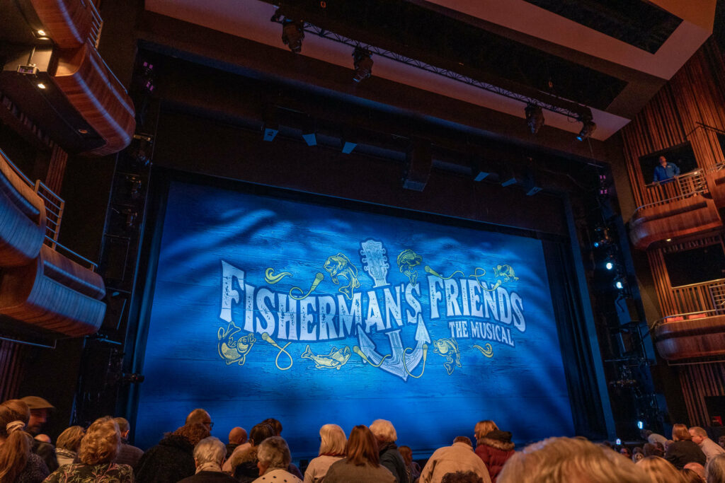 The curtain for Fisherman's Friends the Musical at The Marlowe Theatre, Canterbury