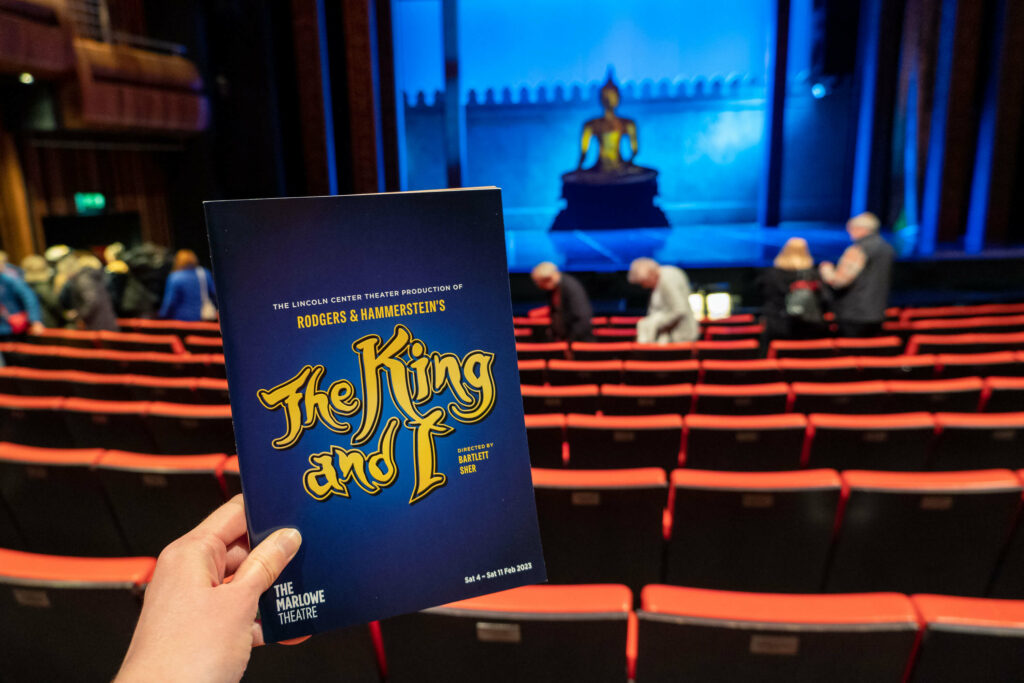 The King and I programme inside The Marlowe Theatre auditorium, Canterbury