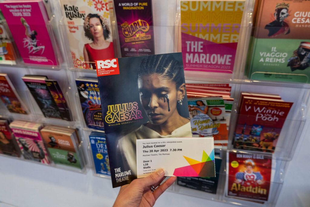 Julius Caesar programme and ticket in the lobby of The Marlowe Theatre, Canterbury