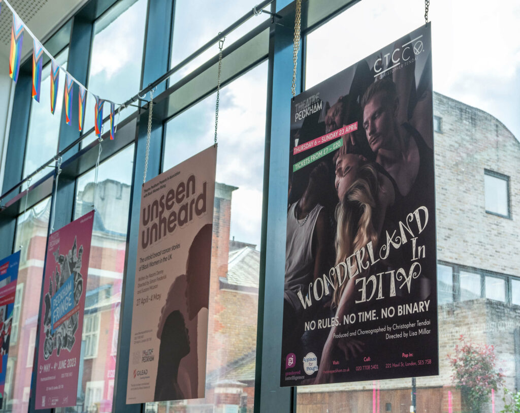 Wonderland in Alice poster in the window at Theatre Peckham