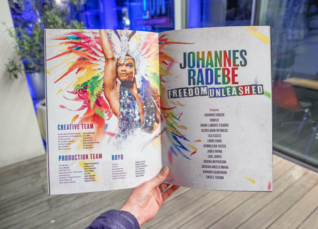 Johannes Radebe: Freedom Unleashed programme outside The Marlowe Theatre in Canterbury, Kent