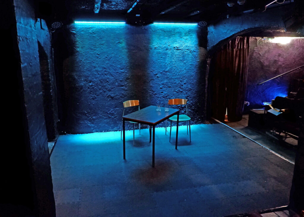The set for 2-Faces play at Barons Court Theatre, London