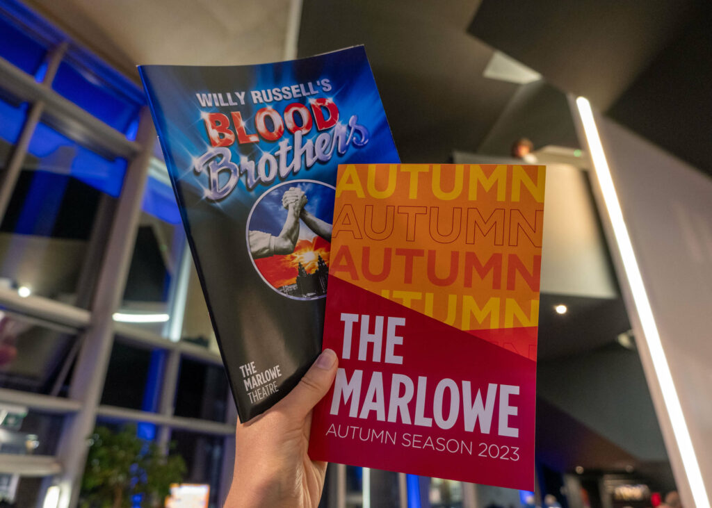 Blood Brothers programme and the season brochure for The Marlowe Theatre