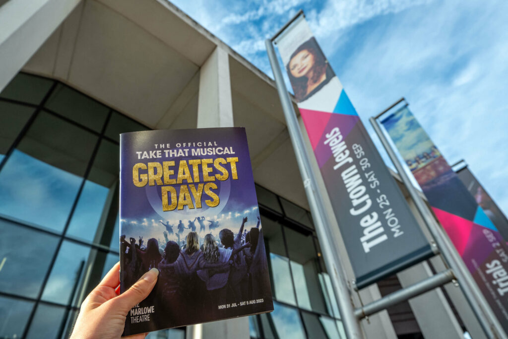 Greatest Days programme in front of The Marlowe Theatre, Canterbury