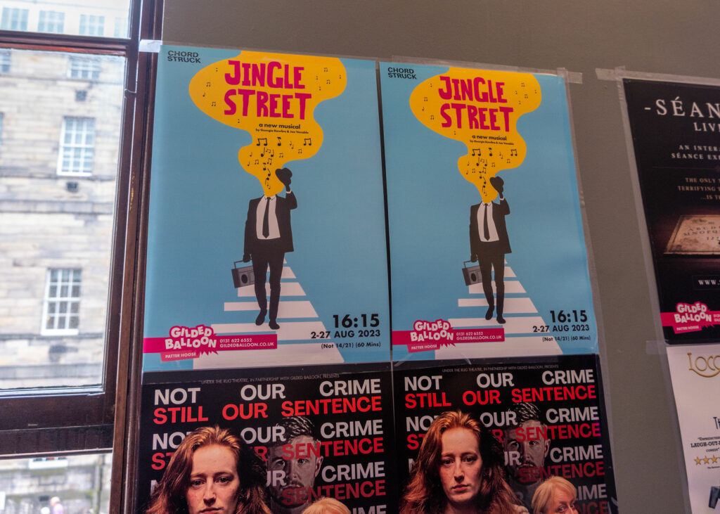 Jingle Street promotional posters at Gilded Balloon Patter Hoose, Edinburgh Fringe