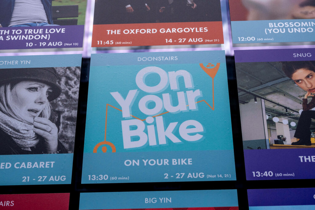 On Your Bike featured on the promotional wall at Gilded Balloon Patter Hoose, Edinburgh Fringe