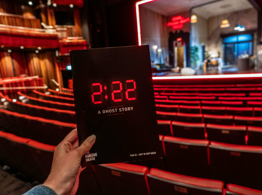 2:22 A Ghost Story programme in front of The Marlowe Theatre stage, Canterbury