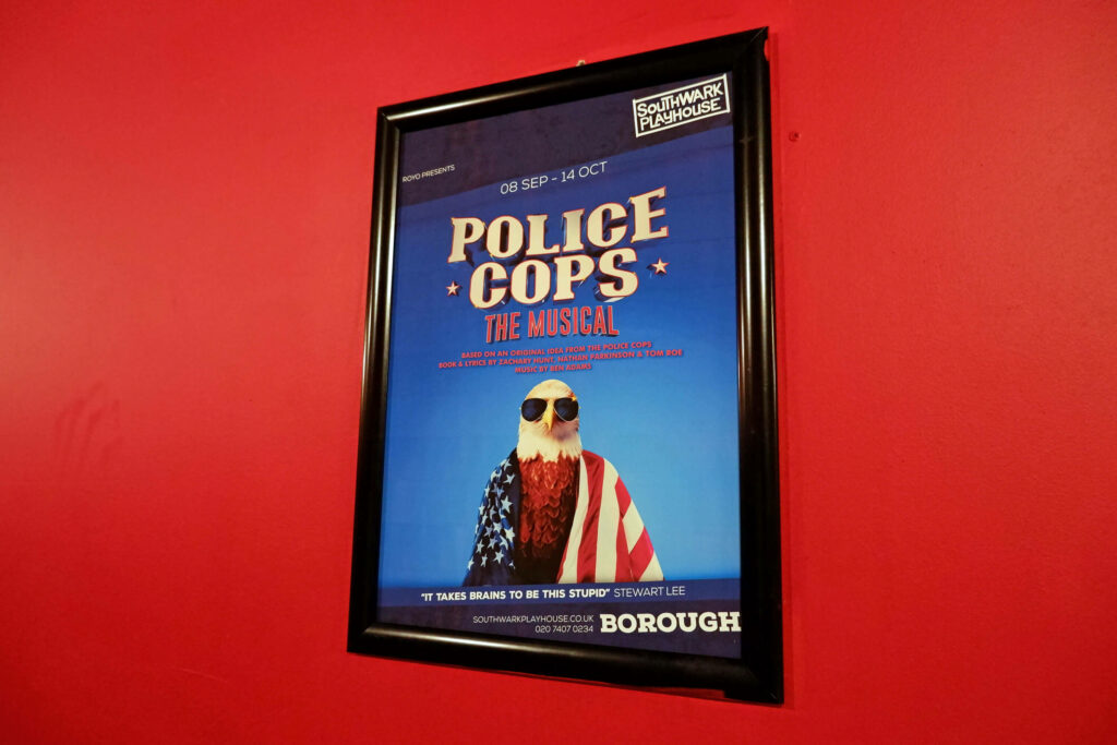 Police Cops: The Musical poster inside Southwark Playhouse Borough