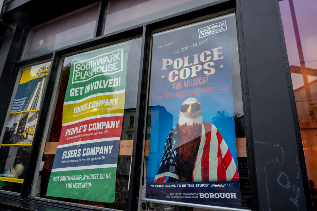 Police Cops: The Musical poster outside Southwark Playhouse Borough
