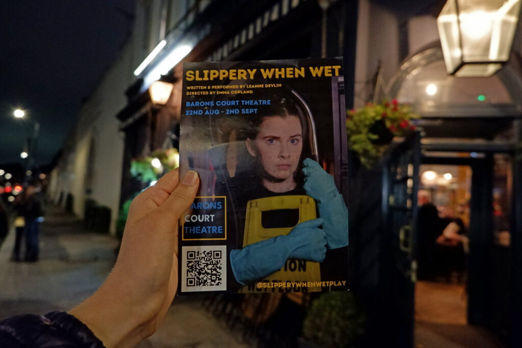 Slippery When Wet leaflet outside Barons Court Theatre, London