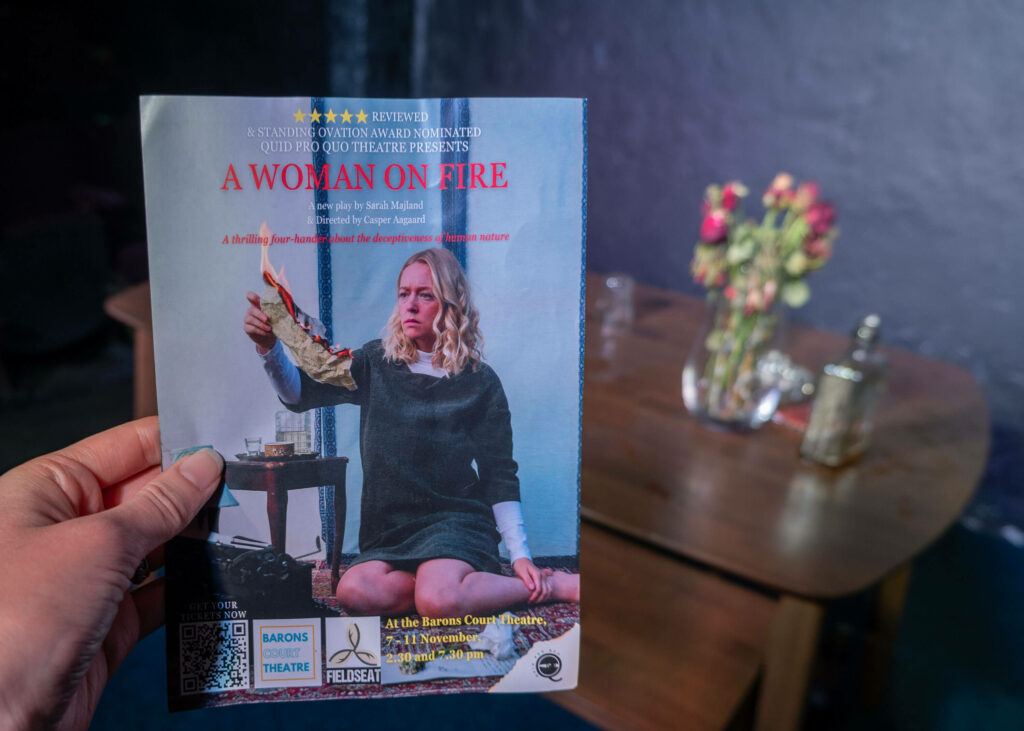 A Woman On Fire leaflet in front of the set at Barons Court Theatre, London