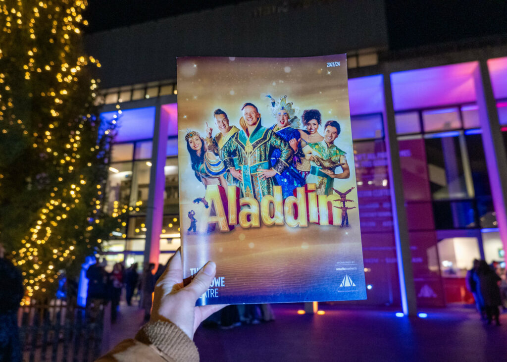 Aladdin programme outside The Marlowe Theatre, Canterbury