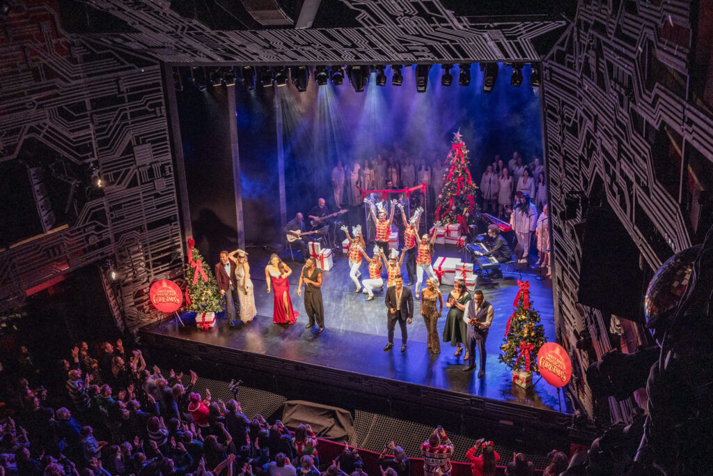 West End Musical Christmas cast performing at The Adelphi Theatre, London
