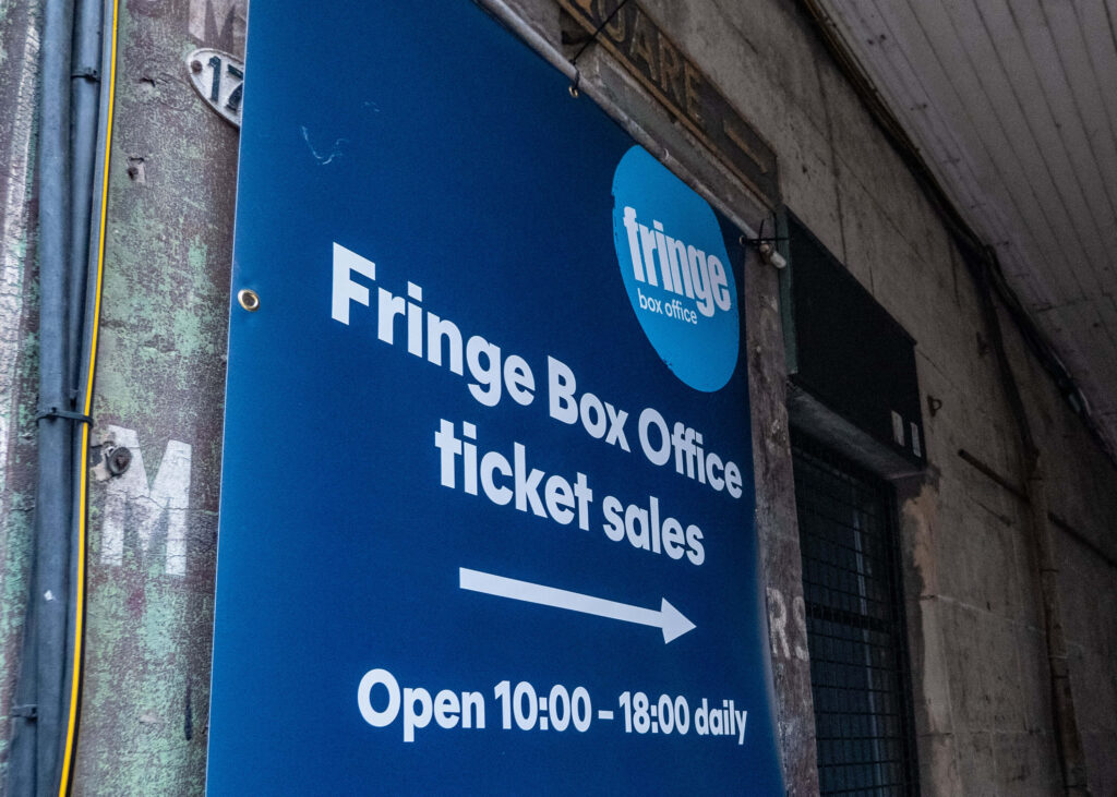 Edinburgh Fringe Box Office poster on the Royal Mile