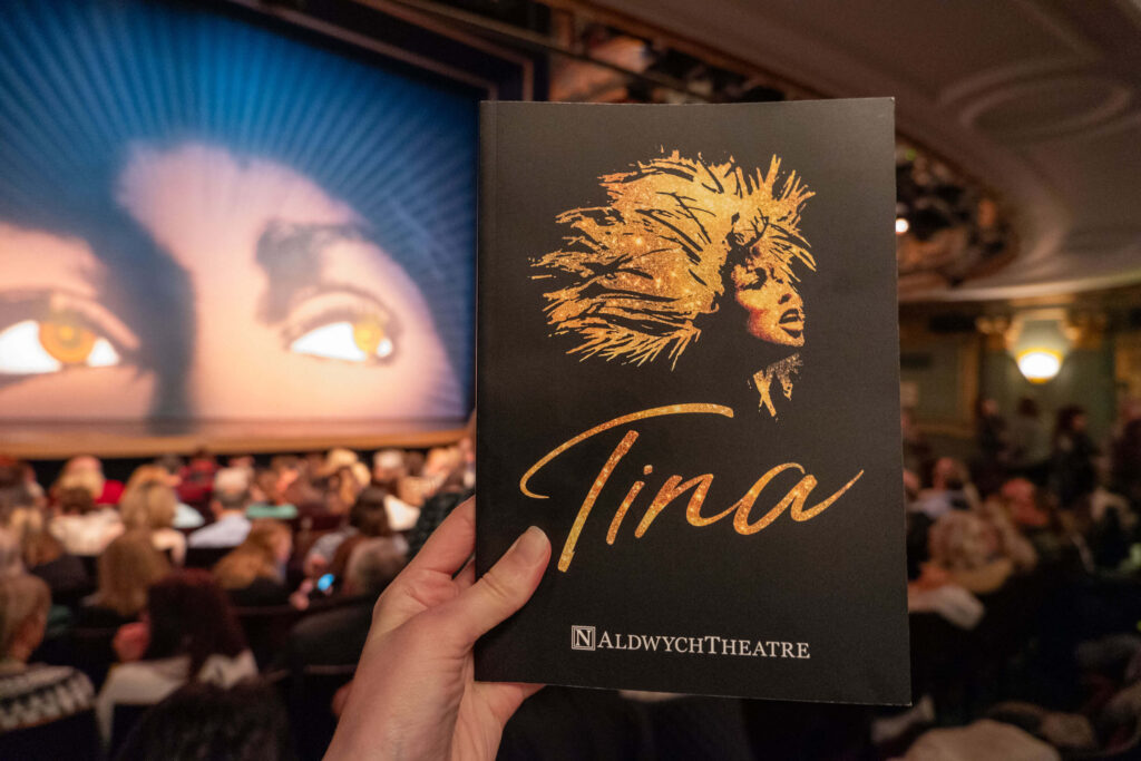 TINA: The Tina Turner Musical programme inside The Aldwych Theatre auditorium in London