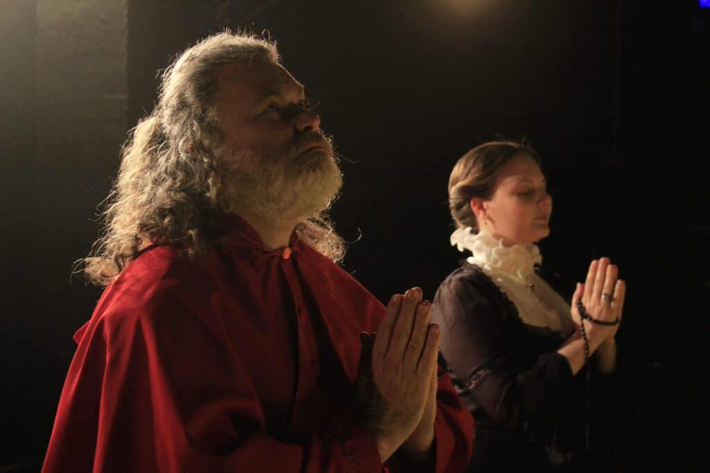 Cardinal Reginald Pole (Les Kenny-Green) and Queen Mary I (Becky Black) in Three Queens at Barons Court Theatre, London