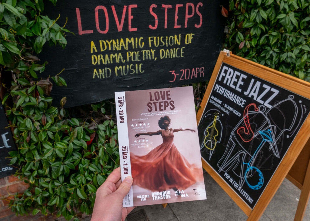 Love Steps leaflet in front of the show description outside the Omnibus Theatre wall in Clapham