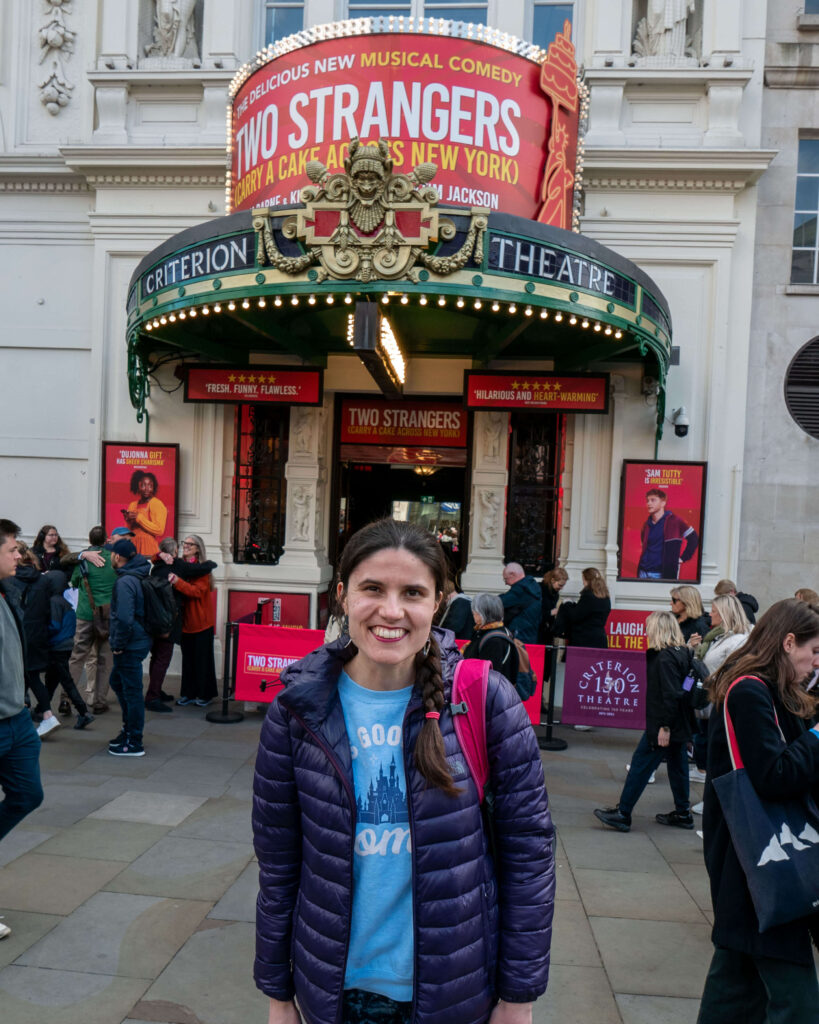 Kat Masterson outside the Criterion Theatre for Two Strangers (Carry a Cake Across New York)