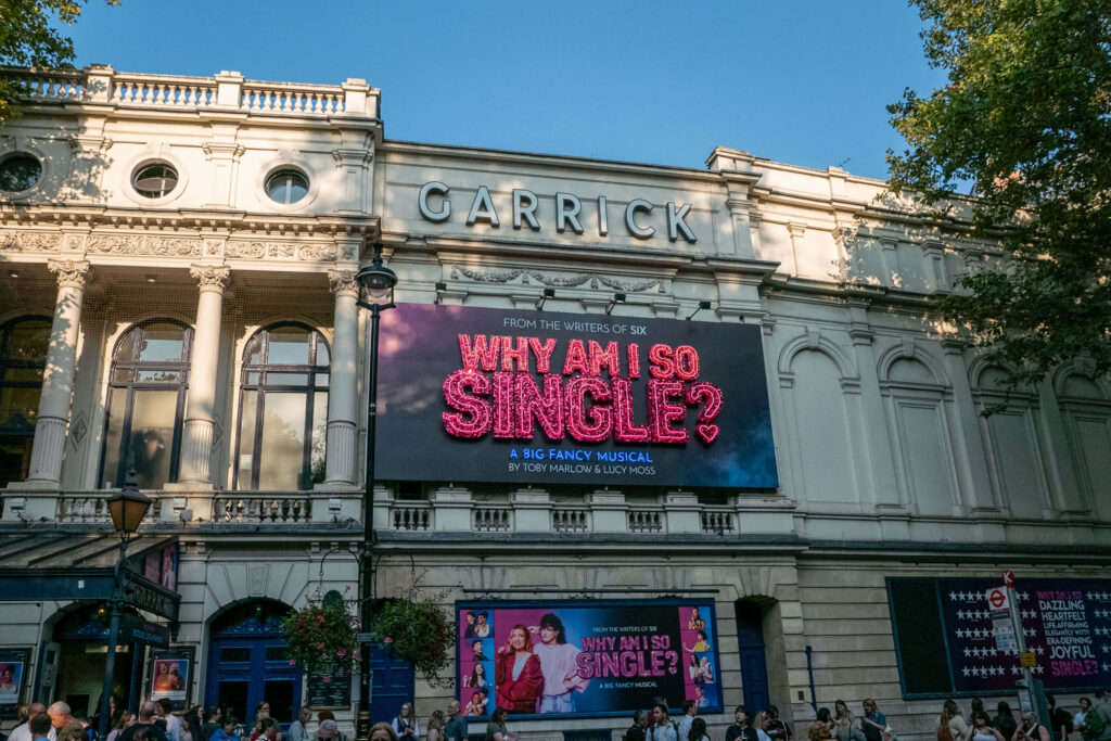 Why Am I So Single? promotional poster outside the Garrick Theatre, London