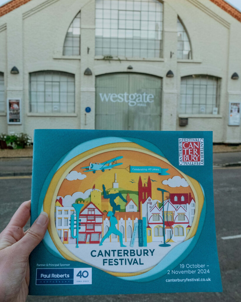 2024 Canterbury Festival programme in front of the Westgate Hall