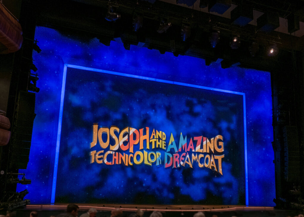 Joseph and the Amazing Technicolor Dreamcoat curtain at the Marlowe Theatre, Canterbury