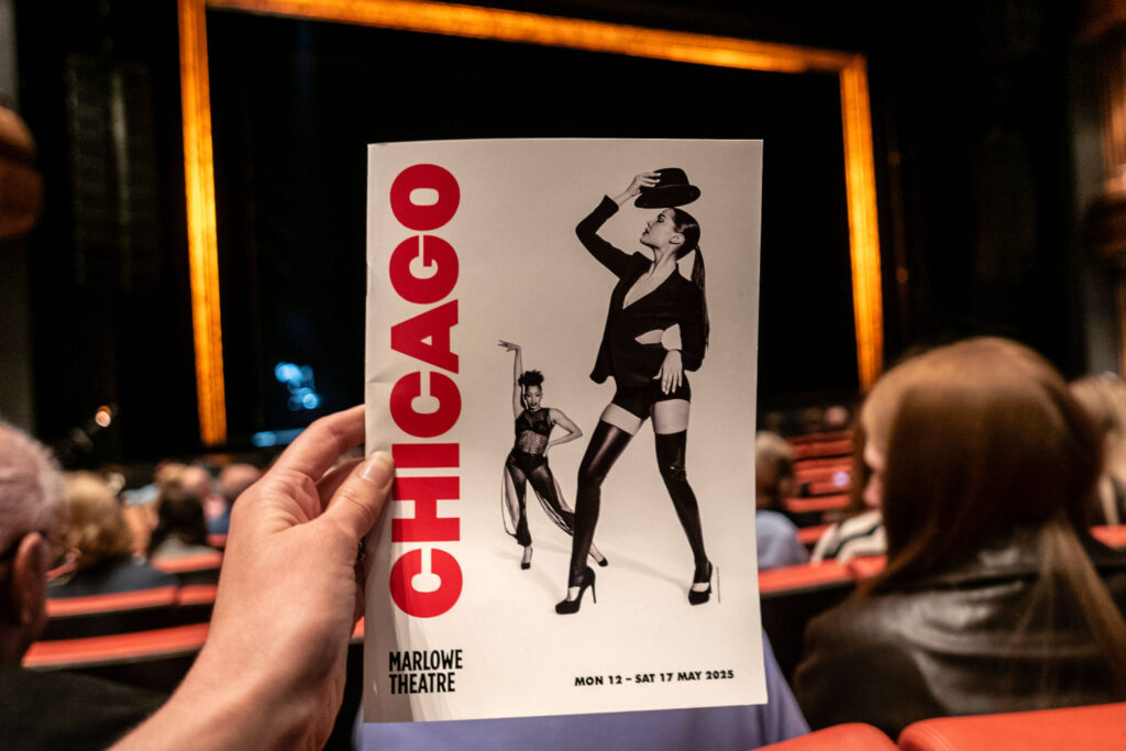 Chicago the Musical programme in front of The Marlowe Theatre stage, Canterbury