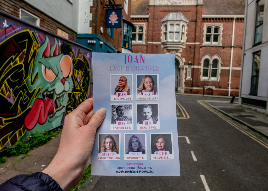 Joan the Musical cast and creatives leaflet outside The Actors Theatre | Brighton Fringe
